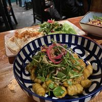 Gnocchi and tapas with beans and avocado  at Rainbow Cafe in Ella