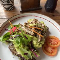 Avo toast with mushrooms (gluten free bread on request)  at Rainbow Cafe in Ella