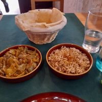 Green beans and rice dishes with bread. at Falafelmania - Restaurante Vegetariano y Vegano Oriental in Alicante