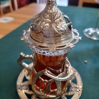 Their special herbal infusion. (With a sugar cube in the lid) at Falafelmania - Restaurante Vegetariano y Vegano Oriental in Alicante