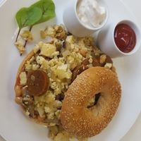breakfast bagel with seitan sausage, tofu scramble, mushrooms and onion.  at 143V in Cork