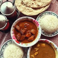 Aloo tomato & tofu korma - try the pickled onions on the condiment rack too, yummo at Jasmine in Don Det