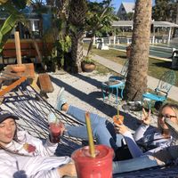 Enjoying our juices on the hammocks! at GoJuice in New Smyrna Beach