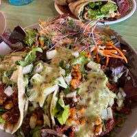 Mexicali Tacos with side salad and El Hefe Burrito in the background at Juice Pharm in Duluth