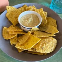 Tortilla chips and nacho cheese at Juice Pharm in Duluth