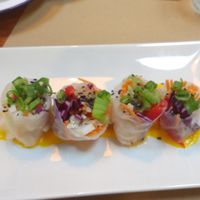 example of first course from the menu - vegetable rolls in rice paper with a tasty sauce at Strata Bakery in Barcelona