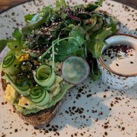 Avocado and scrambled tofu on toast at Seva Table in Dubai