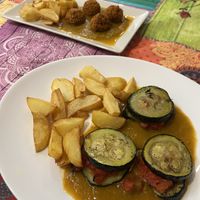 Vegan meatballs and zucchini with tomato   at Telos Comida Casera Natural Vegetariana y Vegana in San Lorenzo De El Escorial