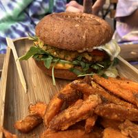 Zucchini burger with sweet potato fries and smoked pepper dip at Tökmag Vegan Street Food in Budapest