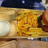 Burger with fries at Tökmag Vegan Street Food in Budapest