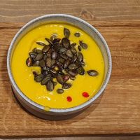 Turmeric lentil soup 🥰 at Tökmag Vegan Street Food in Budapest