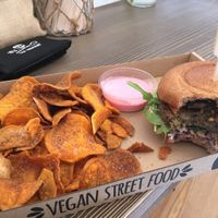 delicious mushroom burger with crispy sweet potato chips and beetroot veganaese at Tökmag Vegan Street Food in Budapest