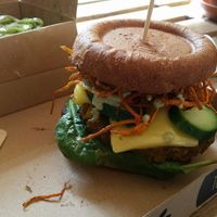 Green peas burger with extra vegan cheese at Tökmag Vegan Street Food in Budapest