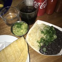 Corn tortillas (left), guacamole, rice and refried beans (right) AMAZING BEANS at The Mexican - Port Douglas in Port Douglas