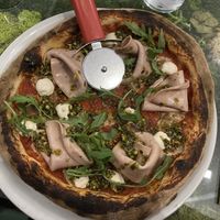 Pizza mortadella y pistacho  at Pizzi & Dixie in Madrid