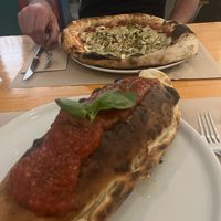 Pizza and calzone   at Pizzi & Dixie in Madrid