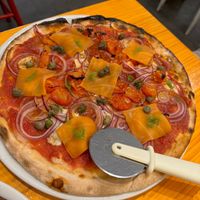 Plant based smoked salmon pizza (gluten free base) at Pizzi & Dixie in Madrid