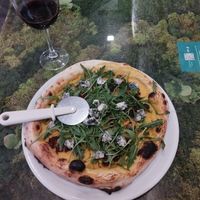 Pizza Gorgonzola and Arugula, pumpkin base at Pizzi & Dixie in Madrid