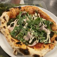 Arugula and ham pizza with pestoo  at Pizzi & Dixie in Madrid