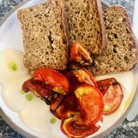 Bread tomatoes and tahini  at Bana in Tel Aviv
