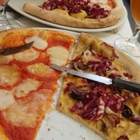 4 cheese and toscana pizza at La Taverna di Pulcinella in Pisa