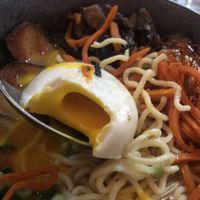 Shoyu ramen 22 - “pork belly” sunny side “egg” braised shiitake, marinated carrots , scallions , enoki, nori, chili oil   at Beyond Sushi in New York City