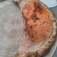 Vegan Calzone baked in a wood fired oven at Birra & Farina in Castelletto Sopra Ticino
