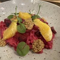 Tagliatelle with beetroot cream, oranges and mustard seeds at Bistro Maha in Ljubljana