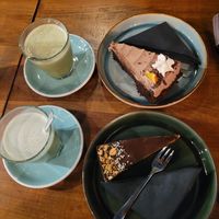 Below: cheesecake above: orange chocolate cake  and 2 matchas at LYR Speciality Coffee and Food in Pecs
