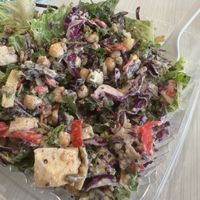 Tofu and falafel added to a vegan Caesar salad. Good stuff    at Ugrean in Orlando