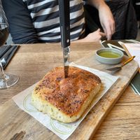 Sharing focaccia   at Woodstone in Haarlem