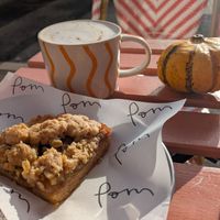 Chai latte and apple crumble cake in the sunshine 😀 at Pom Kitchen - Sharrow in Sheffield