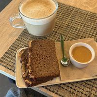 Banana bread with almond butter and chai latte  at Local - Your Healthy Kitchen in Cascais