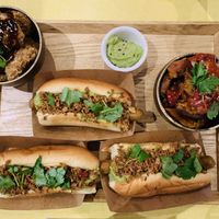 Hot dogs with 2 side dishes (cauliflower hot wings & sweet potato)  at Jah Jah in Paris