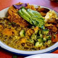 Hot plate with jollof rice and curries at Jah Jah in Paris