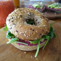 Bagel with hummus and veggies at Sunset Bamboo Bar in Ericeira