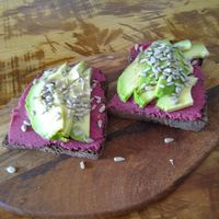 Carob bread with hummus and avocado at Sunset Bamboo Bar in Ericeira