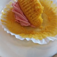 Lemon cupcake with real strawberry frosting. So good I ate most of it before my food arrived :) at Cafe Evolution in Florence