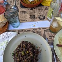 Black rice with mushrooms and avial with naan at El Enano Verde in Torremolinos