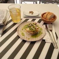 Carpaccio of mushrooms, peach and pesto married really well with baguette bread. at El Enano Verde in Torremolinos