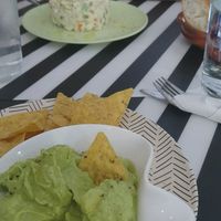 Guacamole con melocotón y nachos  at El Enano Verde in Torremolinos