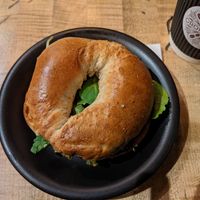 Pistachio mint pesto on a wheat bagel at Oromo Cafe in Chicago