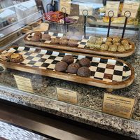 All cookie balls in front are organic and vegan! (end of day so they're almost all gone) at Oromo Cafe in Chicago