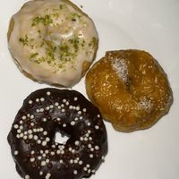 Donuts de chocolate, limão e doce de leite com coco. at Bike Vegan in Fortaleza