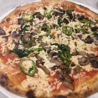 Pizza with spinach, mixes mushrooms, jalapenos and vegan cheese at Monte Carlo - 800 Degrees in Las Vegas