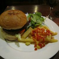 veggie burger and fries  NPR 3100 at New Orleans Cafe & Wine Bar in Kathmandu