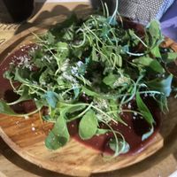 Vegan ‘meat’ with rocket and Parmesan  at Nirvana in Florence