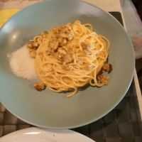 Spaghetti Carbonara with parmesan at Nirvana in Florence