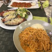 Ravioli, spaghetti amatriciana, eggplant parm  at Nirvana in Florence