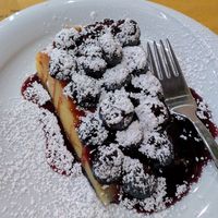 Tofu cake is just like flan with grapes and a little chocolate sauce at Nirvana in Florence